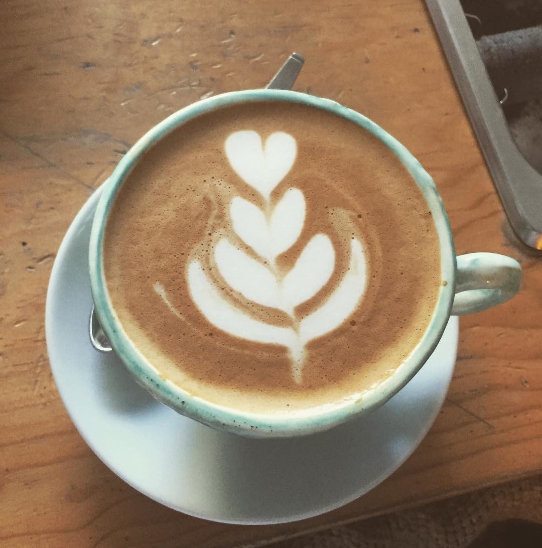 a cup of coffee on a table