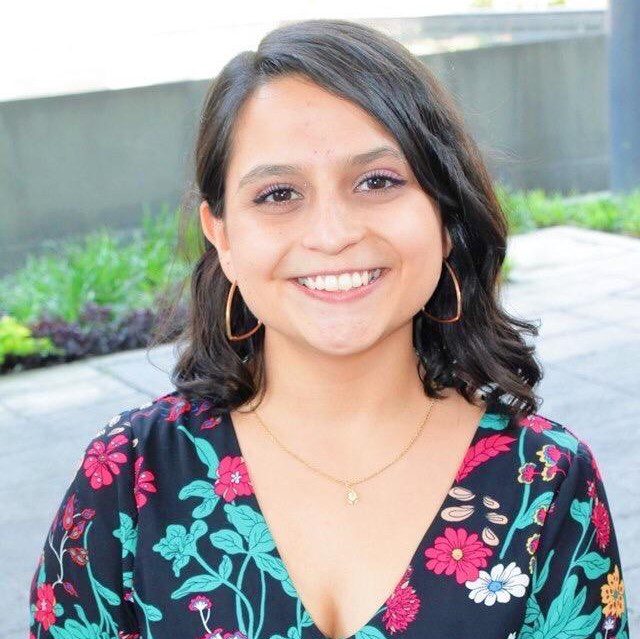 a woman smiling for the camera