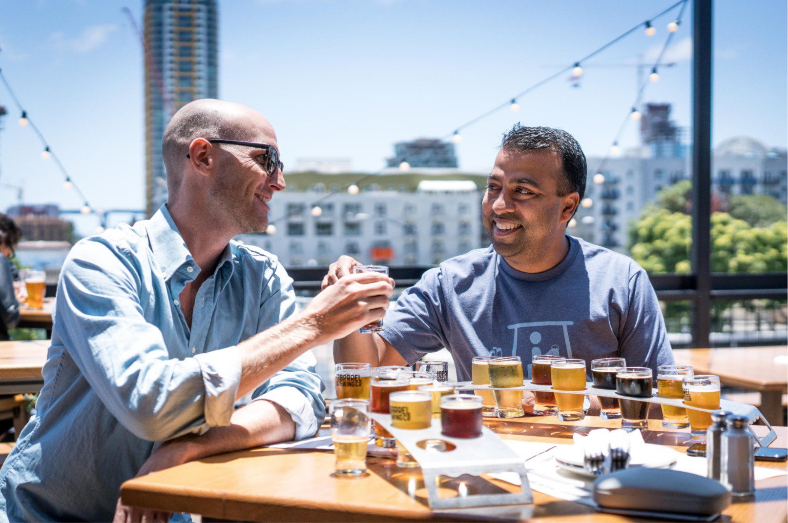 Cowerkers tasting different kinds of beer