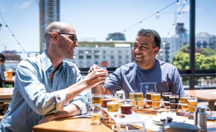 Cowerkers tasting different kinds of beer